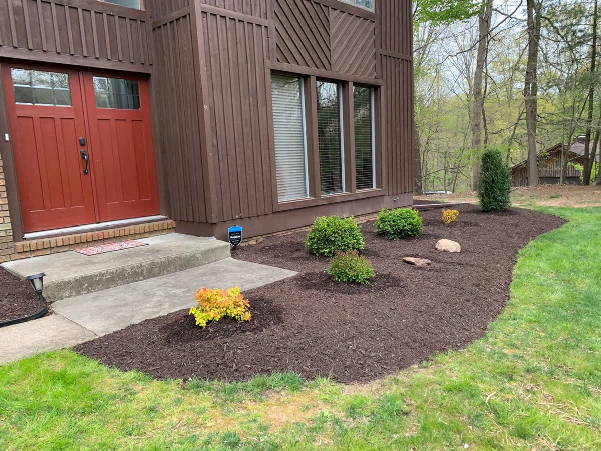 Fresh mulch bed and planting install by Green Diamond in Reisterstown, MD