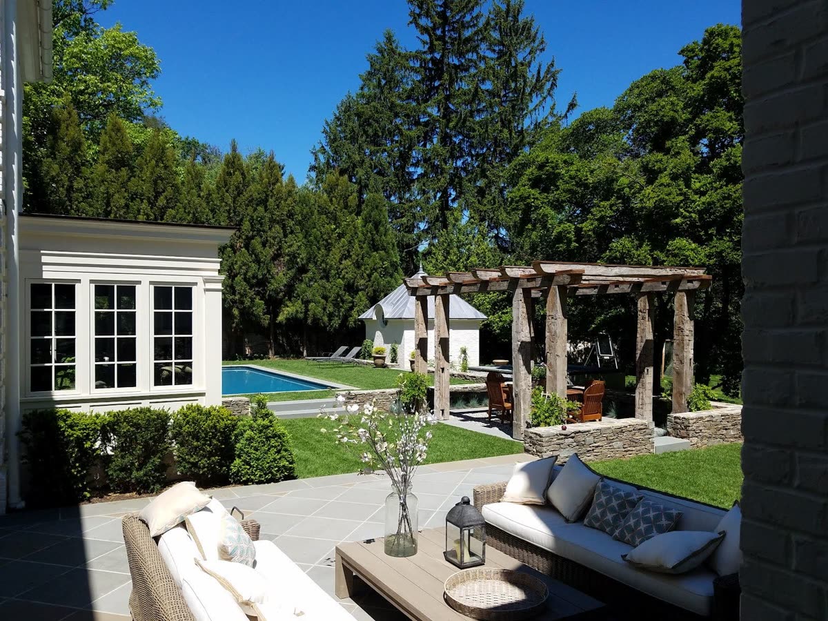 Pool patio and pergola hardscape maintained by Green Diamond