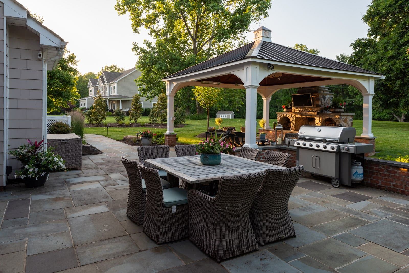 Pavilion patio with stone outdoor kitchen